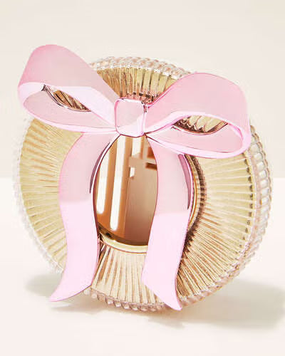 PORTA AROMATIZANTE PARA AUTO - MOÑO ROSA